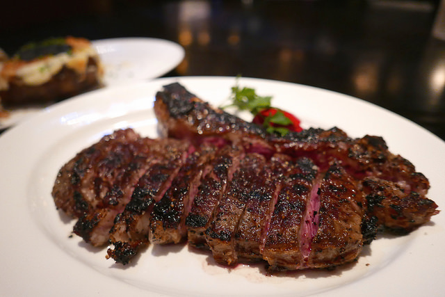 Dinner Is Grilled Over an Open Flame at The Red Hen, Just Around the Corner From 77 H